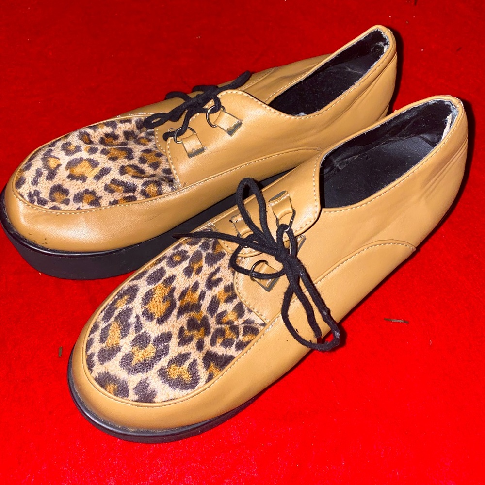 Platform flat shoes with cheetah fur detailing